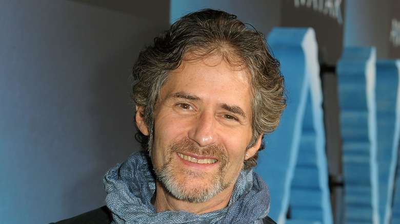 James Horner smiling wearing scarf