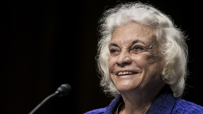 Sandra day O'Connor smiling looking to side