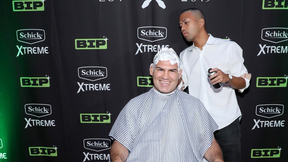 Man's head being shaved