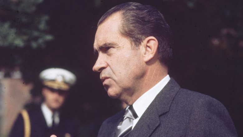 Richard Nixon looking to side