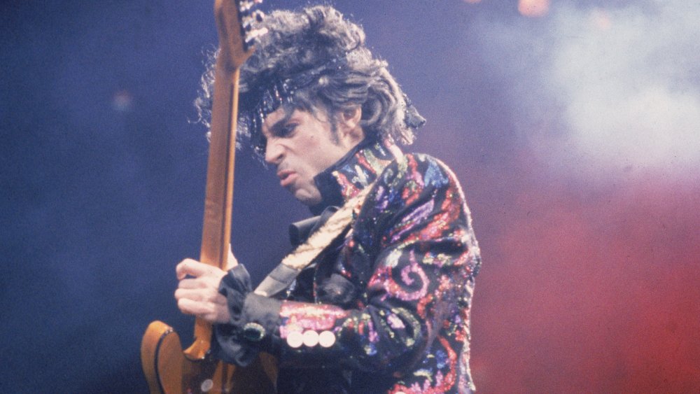 Prince playing guitar