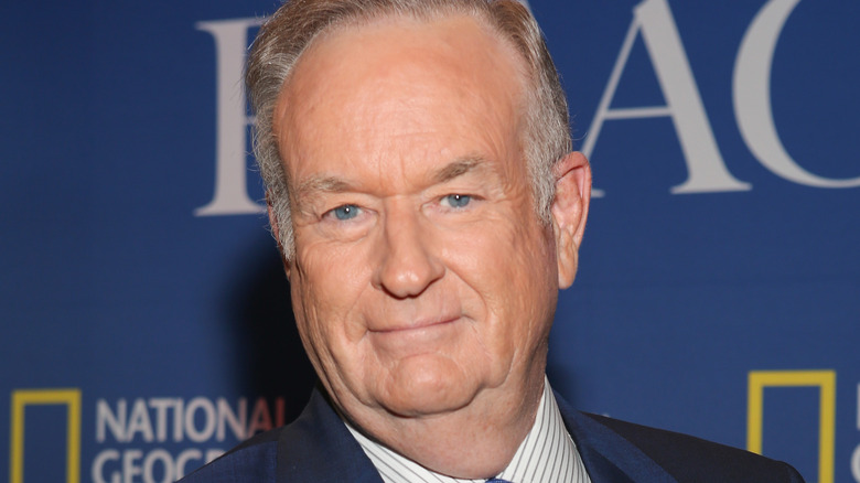 Bill O'Reilly in blue suit and tie