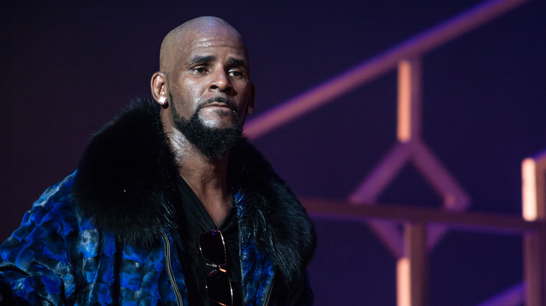 R. Kelly onstage in fur coat