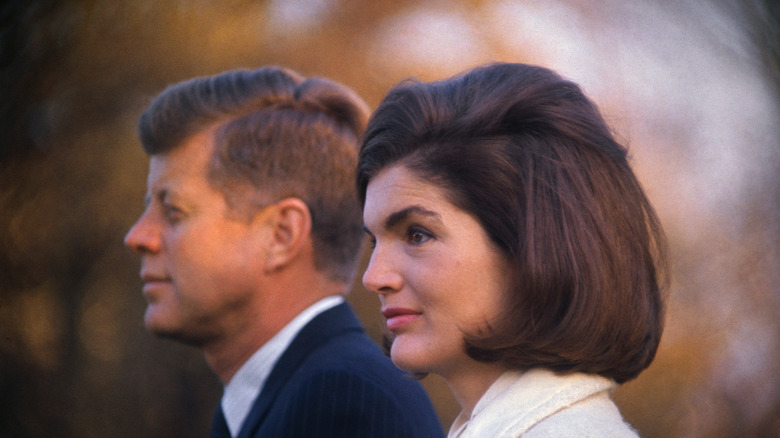 jackie and john f. kennedy standing suits