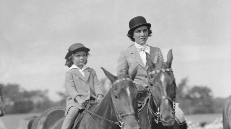 young jackie bouvier and mother riding horses