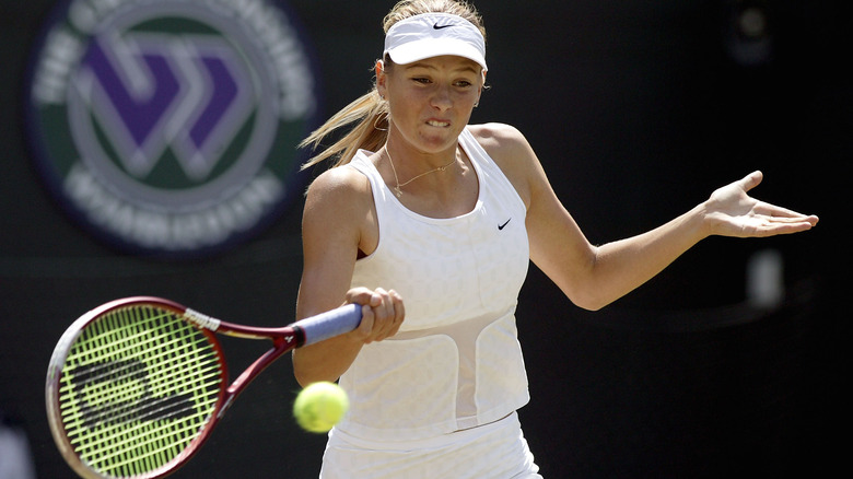 Sharapova hitting tennis ball