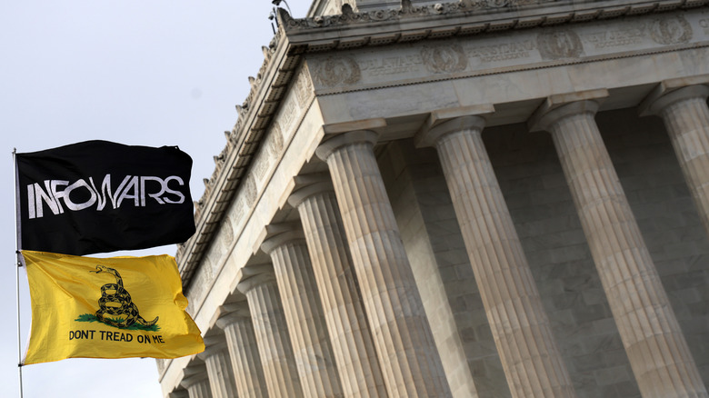 Infowars flag outside courthouse