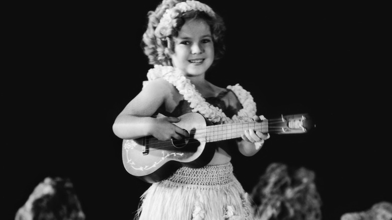 Shirley Temple playing the ukulele