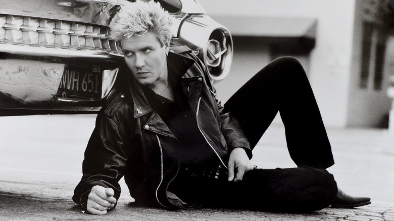 Simon Le Bon with car in 1985, black and white