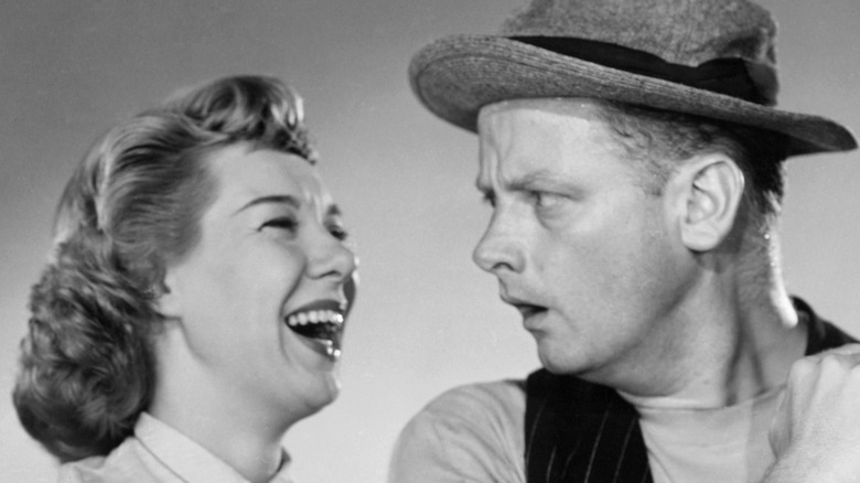 Joyce Randolph laughing and Art Carney shocked hat