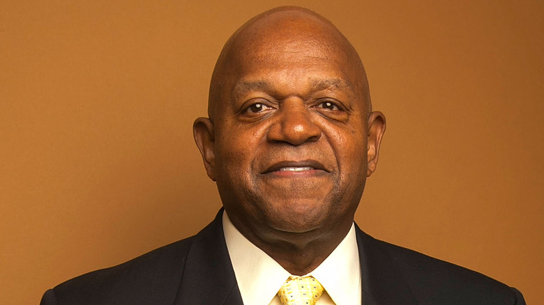 charles s. dutton biting lip dark suit