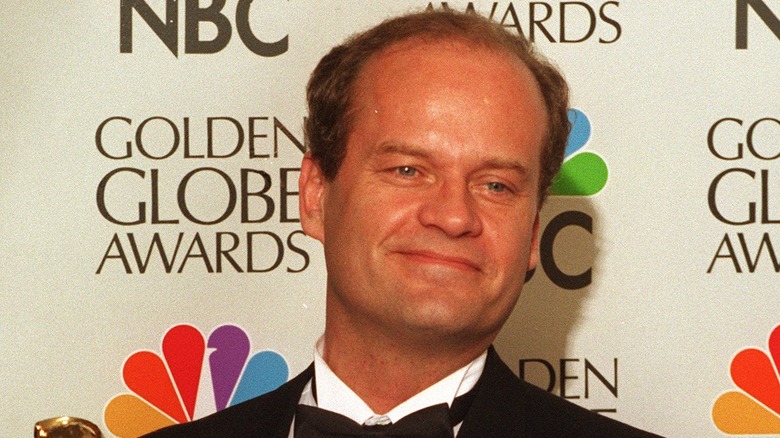 kelsey grammer smirking tuxedo golden globes