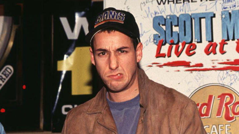 Adam Sandler making a fake angry face during a radio interview