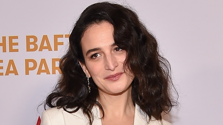 jenny slate pursed lips head cocked