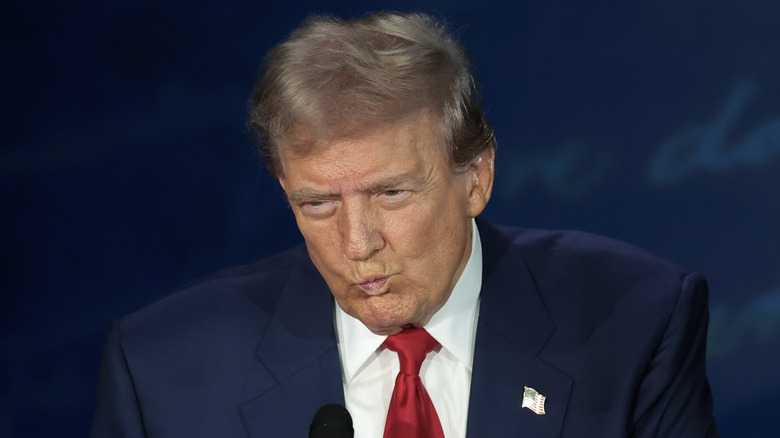 donald trump squinting puckering lips