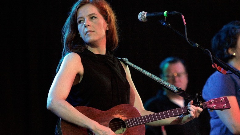 Neko Case playing guitar