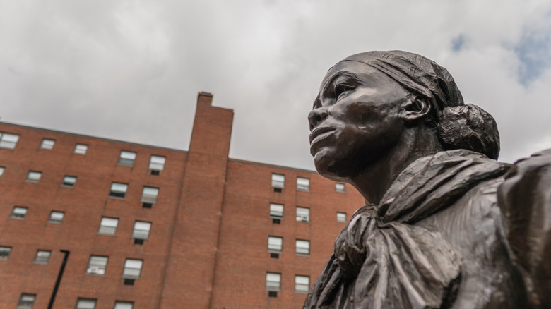 Statue of Harriet Tubman cloudy sky