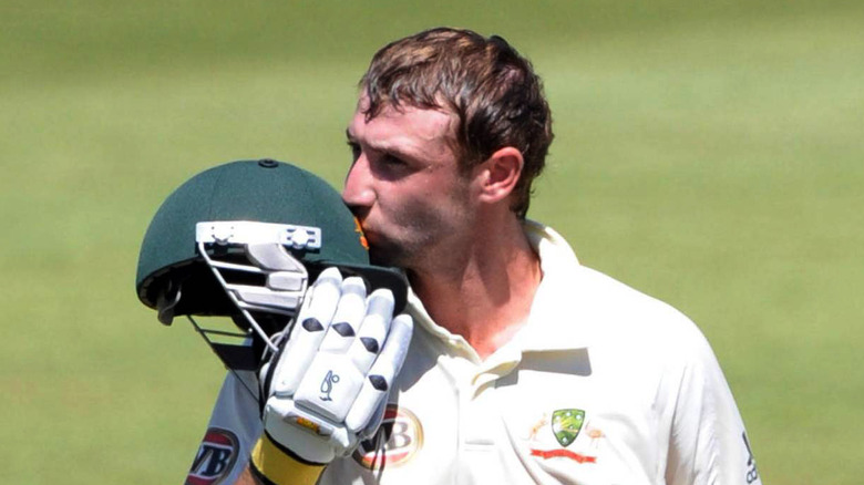 Phillip Hughes kisses cricket helmet