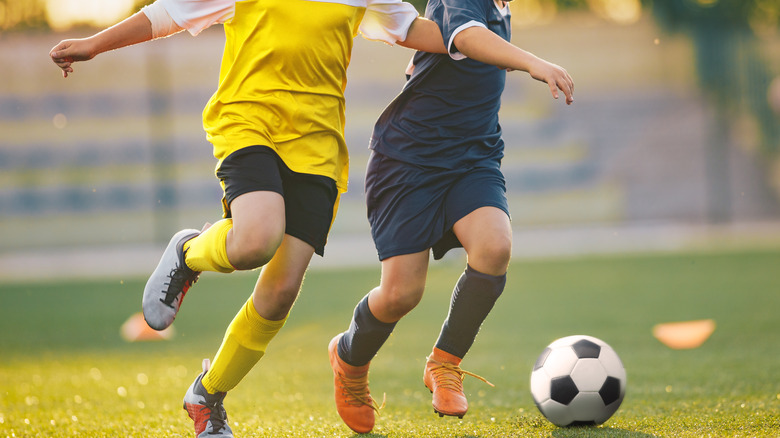 Playing soccer