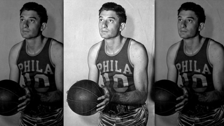 Joe Fulks in a stages shot shooting a ball in 1946