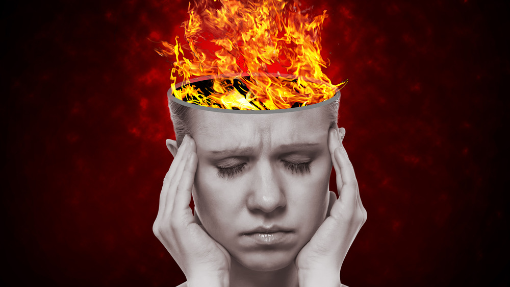 woman's head on fire