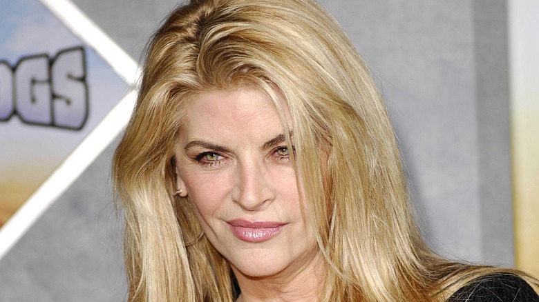 Kirstie Alley smirking blond hair at event