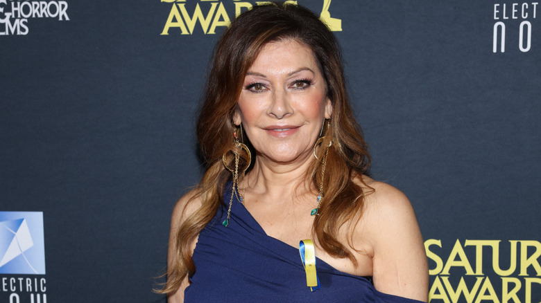 Marina Sirtis posing in blue dress at the Saturn Awards