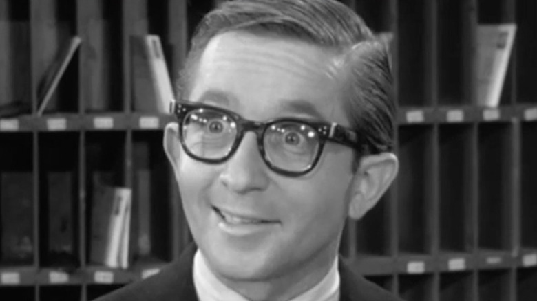 Arte Johnson in glasses looking excited
