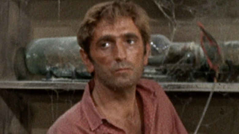 Harry Dean Stanton staring 