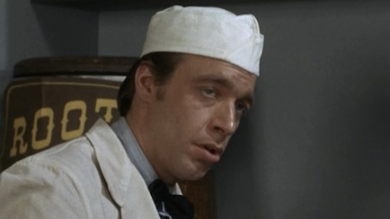 Howard Hesseman in cooking hat staring