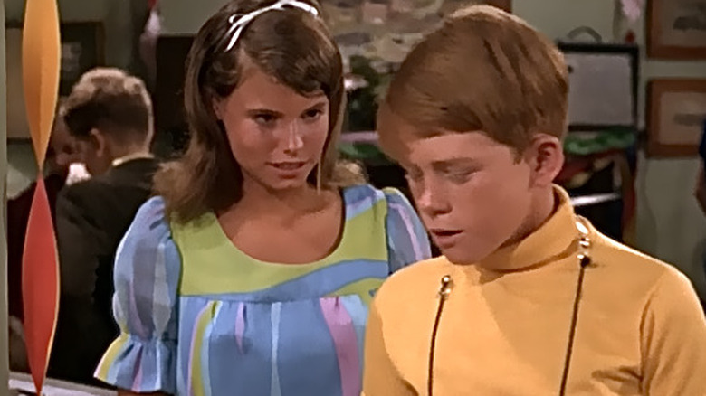 Kay Lenz staring at Ron Howard