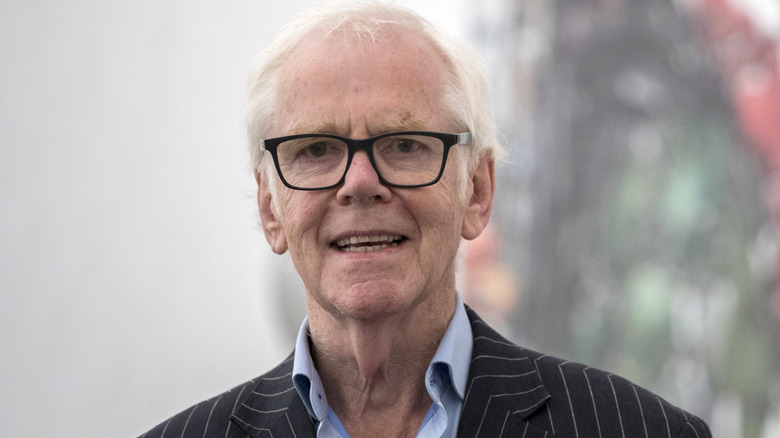 jeremy bulloch striped suit glasses smiling