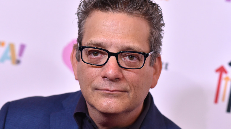 andy kindler peering into camera glasses