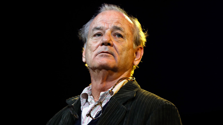 Bill Murray staring ahead black background