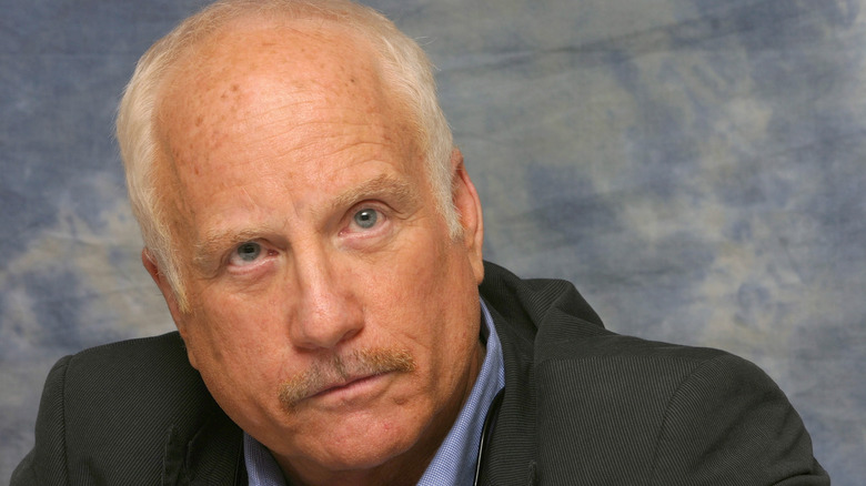 Richard Dreyfuss staring ahead in suit