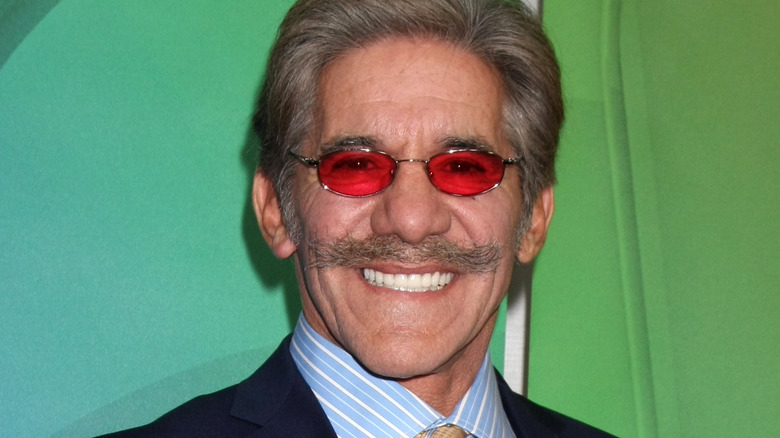 geraldo rivera moustache grinning red glasses