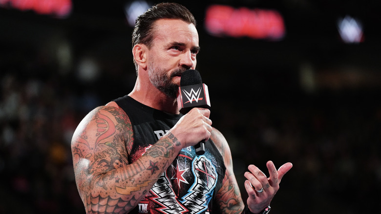 CM Punk speaking at a WWE event