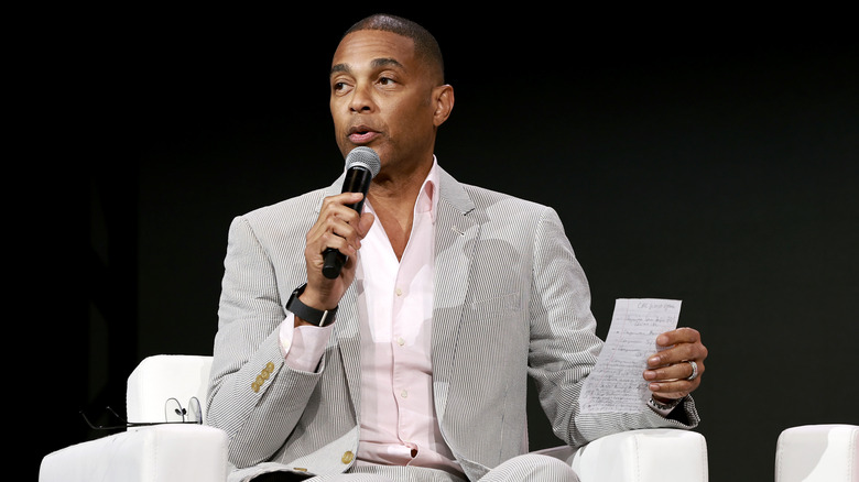 Don Lemon white suit sat speaking