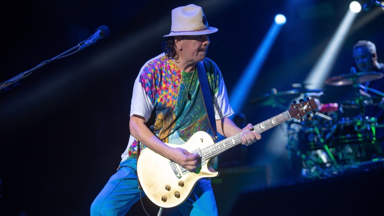 Carlos Santana playing guitar