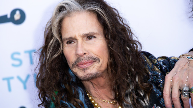 Steven Tyler looking to the side