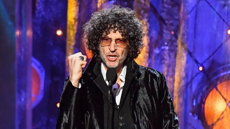 Howard Stern onstage during the Rock and Roll Hall of Fame induction ceremony