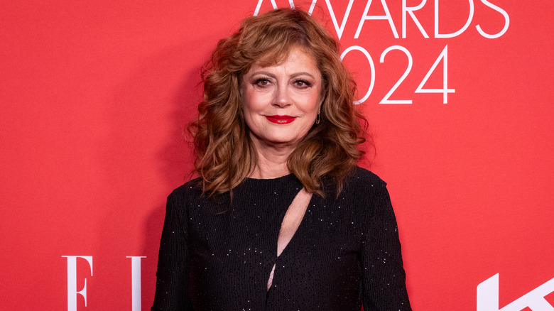 Susan Sarandon black dress smiling at event