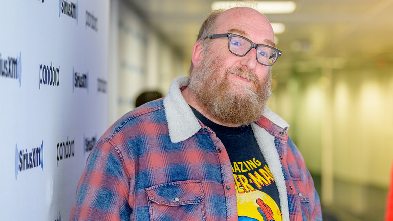 Brian Posehn posing for a photo at the SiriusXM Studios in 2020