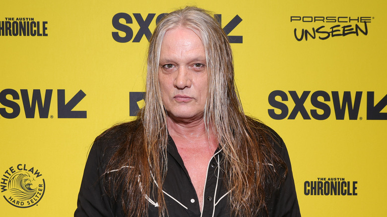 Sebastian Bach posing for photo