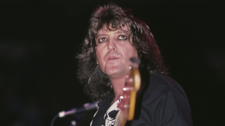 bob daisley playing bass long hair eyeliner