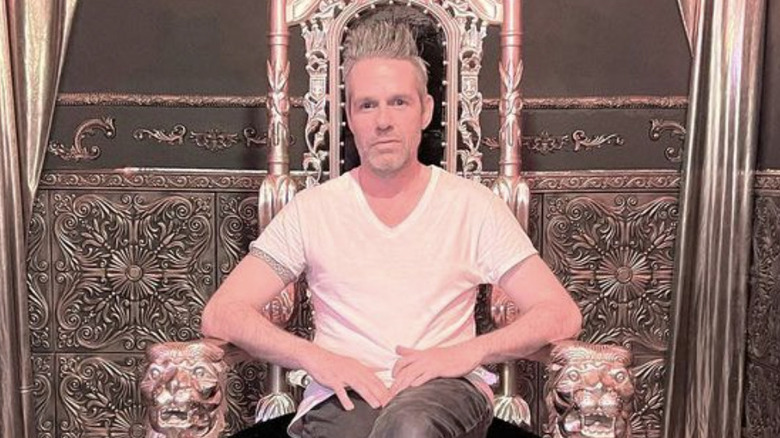 andrew bennett white shirt sat on throne