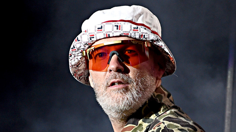 fred durst floppy hat rose glasses