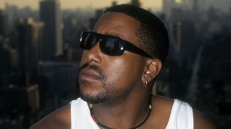 tone loc looking up sunglasses