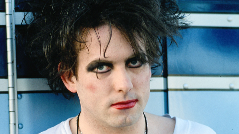 Robert Smith on stage with guitar