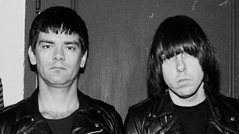 Dee Dee Ramone and Johnny Ramone scowling in a black and white Ramones publicity pic from the 1970s